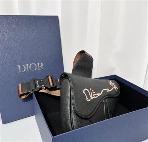 dior x cactus jack saddle bag|Dior cactus jack necklace.